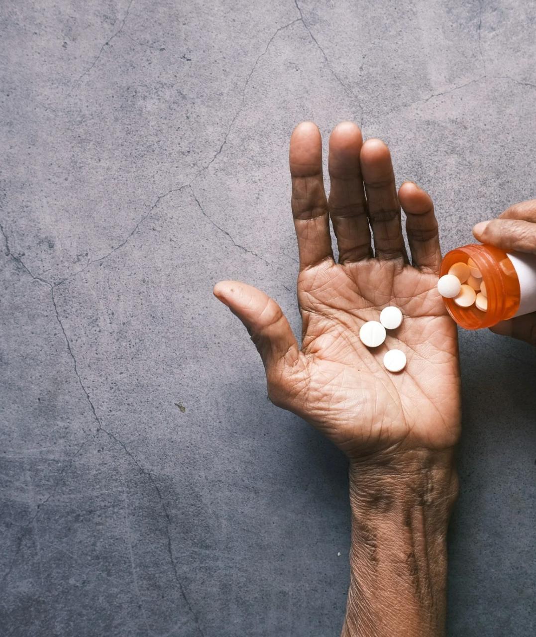 Hand holding medication